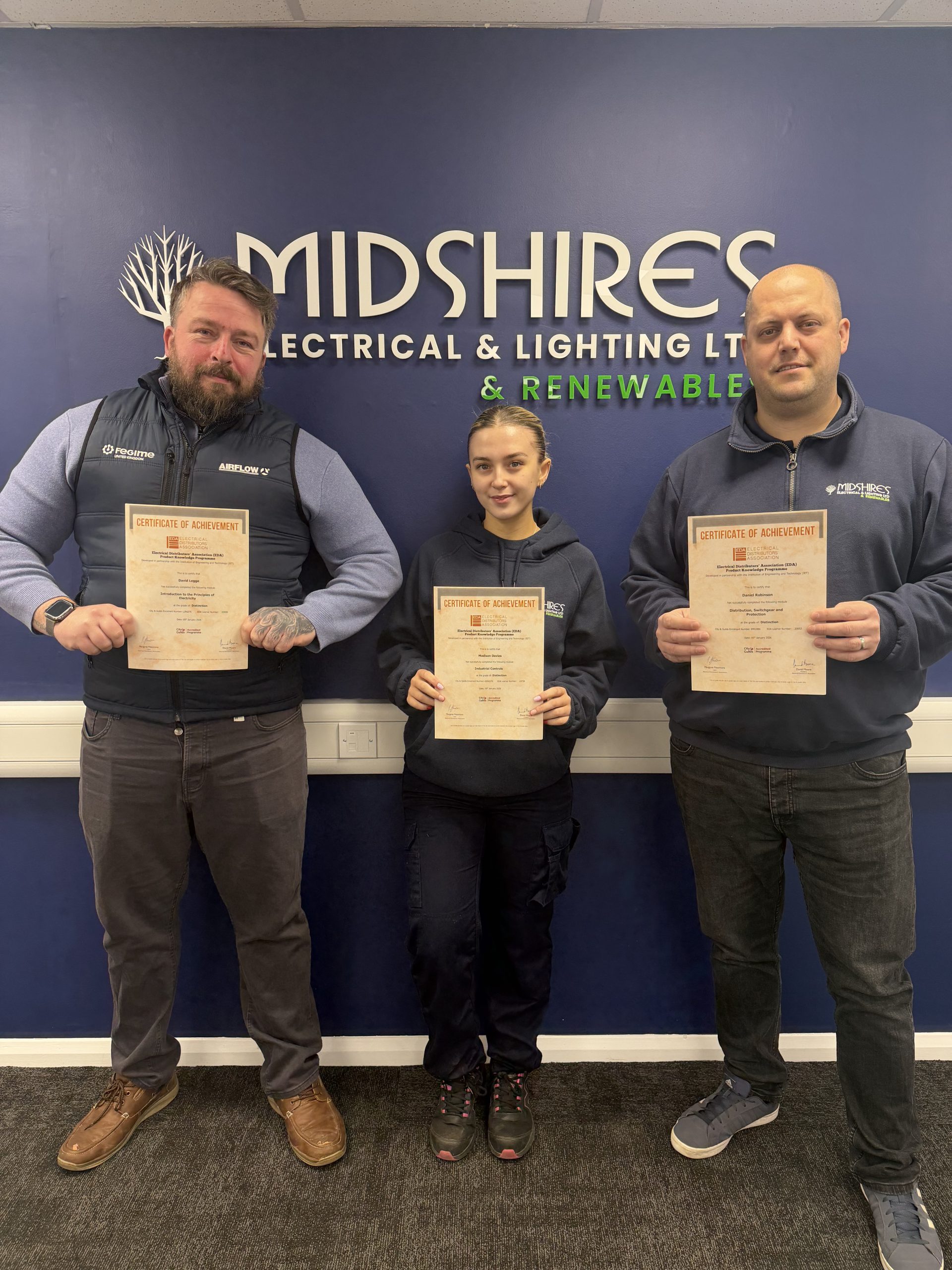 3 staff members, with their eda certificates